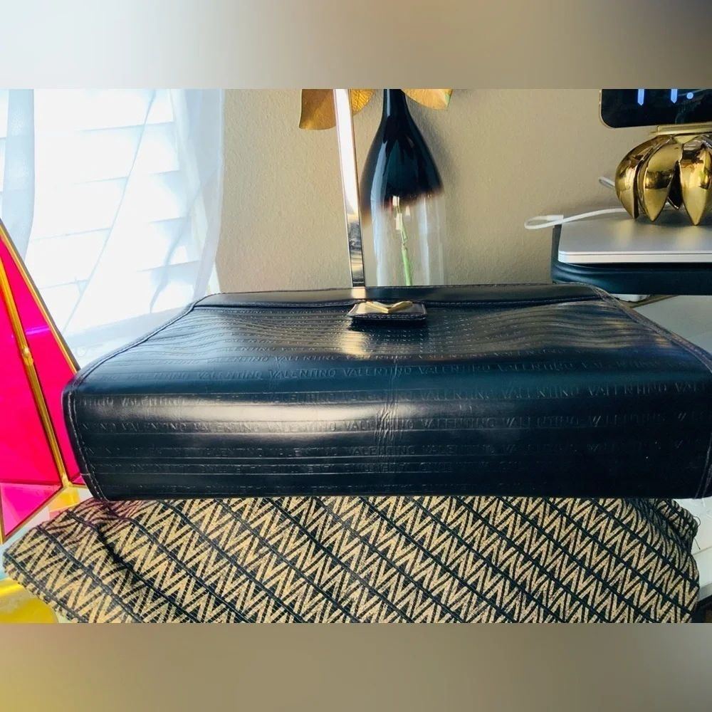 VGT Mario Valentino authentic. Black classy clutch/purse Gold Detail “Host Pick”